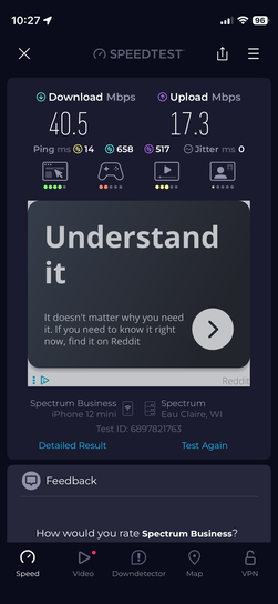 Speedtest mobile app screenshot showing download speed of 40.5 Mbps, upload speed of 17.3 Mbps, ping of 14ms with Reddit advertisement displayed on Spectrum Business connection