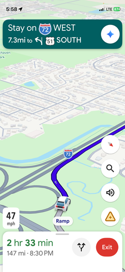 iPhone screenshot of Google Maps navigation on I-72 West approaching the US-51 South interchange, showing 47 mph with 2 hours 33 minutes and 147 miles remaining.