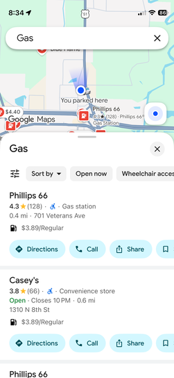 iPhone screenshot of Google Maps gas station search near Vandalia showing Phillips 66 and Casey's both at 3.89 per gallon regular.