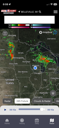 iPhone screenshot of First Alert 15 Weather radar app showing storms across the upper Midwest centered on Belleville, Wisconsin at 6:08 AM.