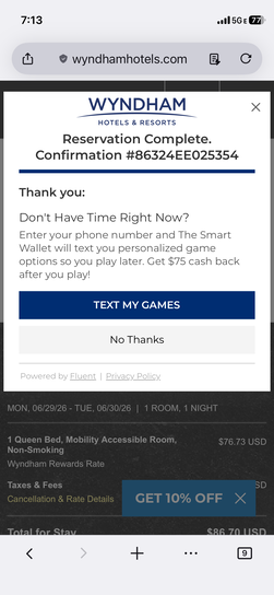 iPhone screenshot of the same Wyndham reservation confirmation with a follow-up promotional popup offering to text game options for the 75 dollar cash back offer.