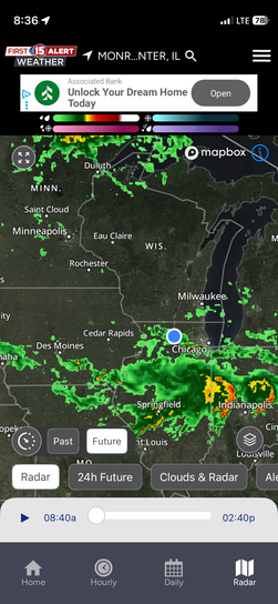 Smartphone screenshot of the First Alert 15 Weather radar app showing a large band of severe storms stretching across Illinois.
